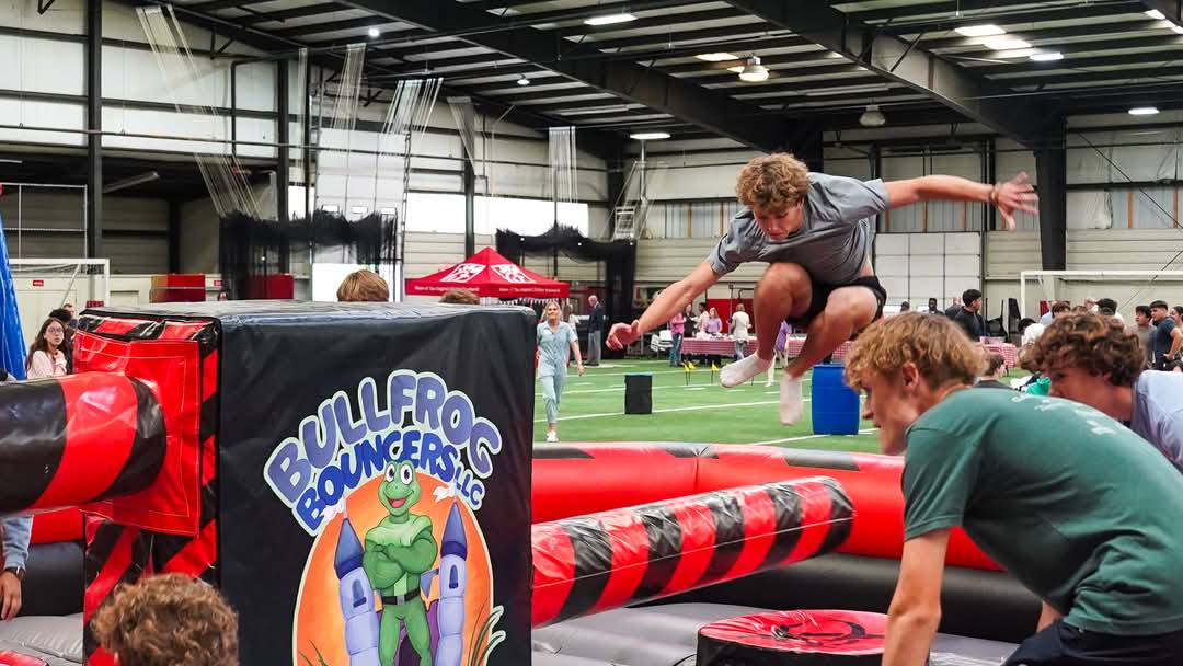 Frog Forge Wipeout mechanical game at corporate team building event